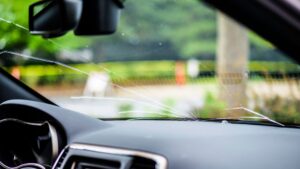 A car with a small crack on the windshield.