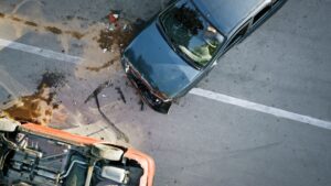 Two wrecked cars after colliding with one another.