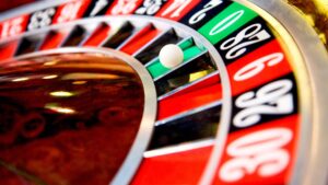 A roulette with ball landing on the 00 space.