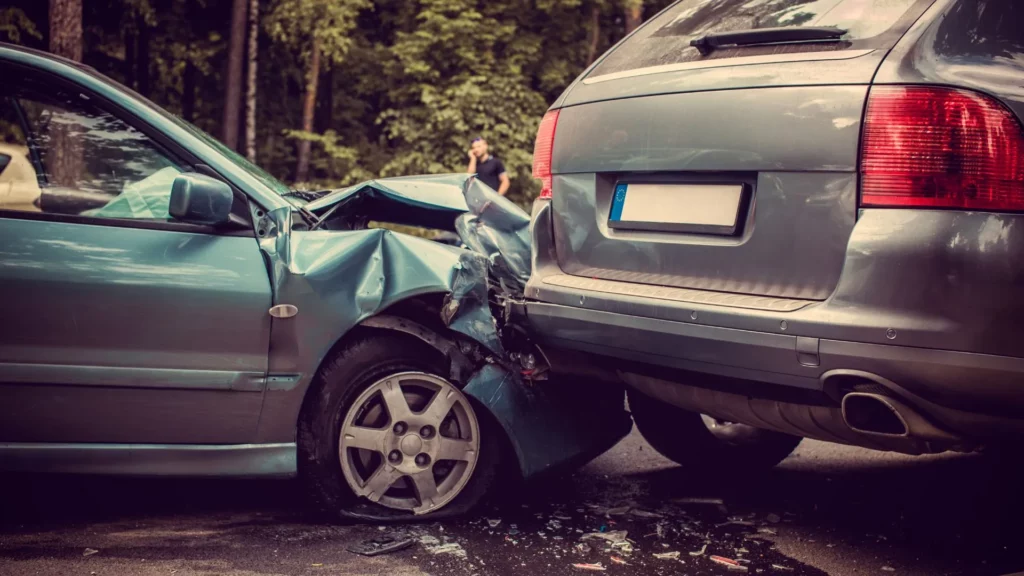 A blue car that got into an accident with another car.