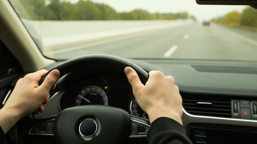 A person driving on the road.