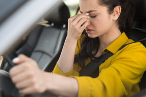 Picture of a women showing Pain and Suffering After a Car Accident