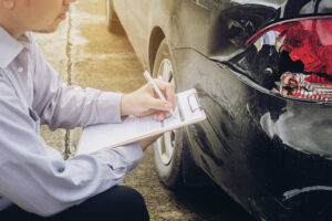 agent working on car accident claim process